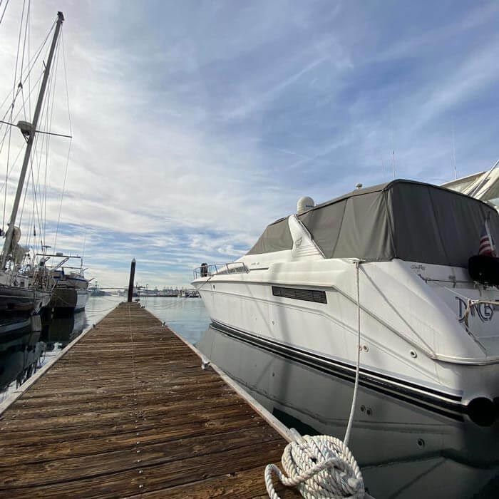 yacht docked at marina